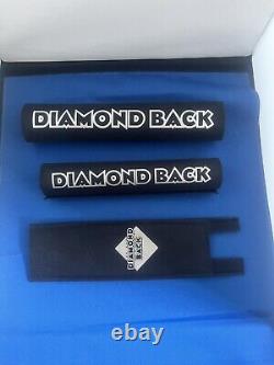 Ensemble de protections Diamondback BMX Old School, noir avec impression argentée. Tout neuf