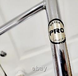 Hutch Pro Bars Handlebars Old School BMX translates to 'Guidon de barres Hutch Pro pour BMX style ancienne école' in French.
