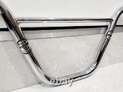Hutch Pro Bars Handlebars Old School BMX translates to 'Guidon de barres Hutch Pro pour BMX style ancienne école' in French.